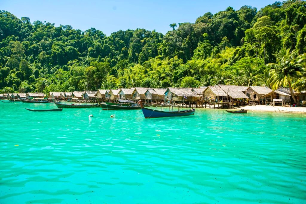 Bright turquoise sea and traditional Moken village houses in the Surin Islands