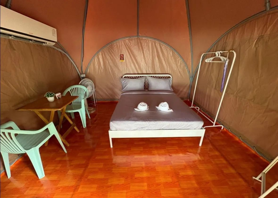 Air-conditioned tent with a proper bed and cooling unit