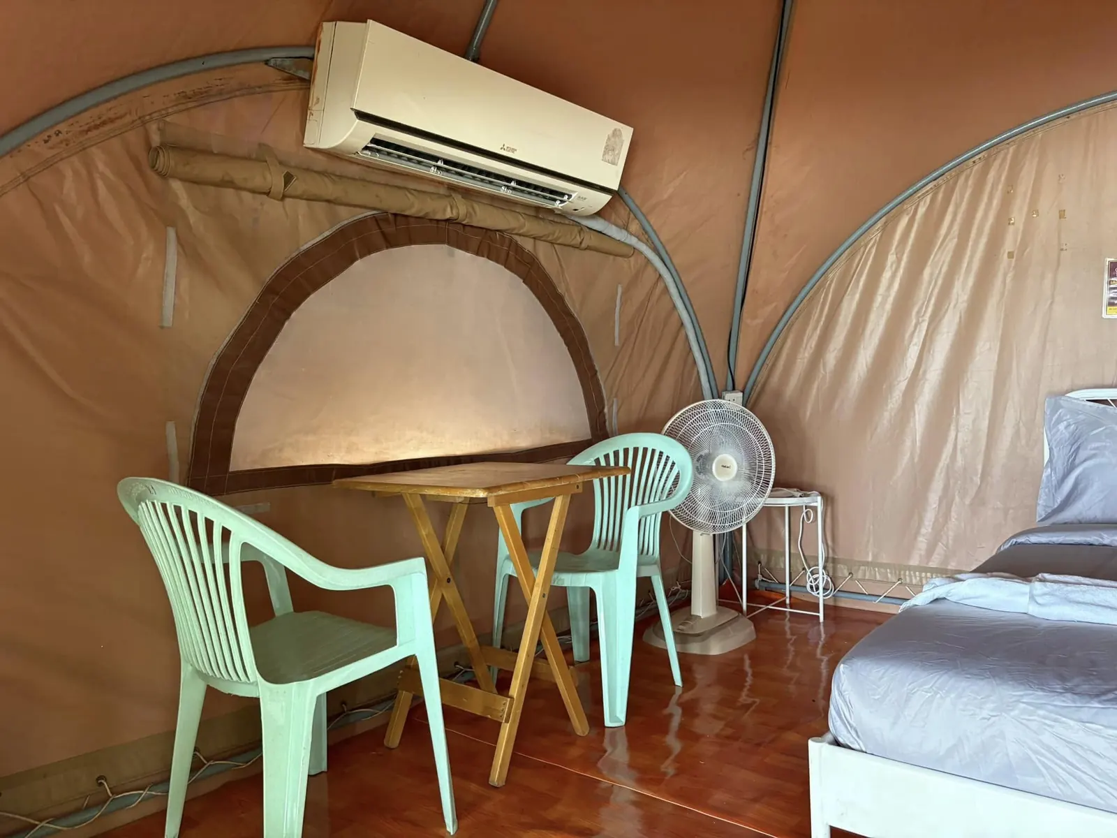 Air-conditioning unit and seating inside the canvas tent