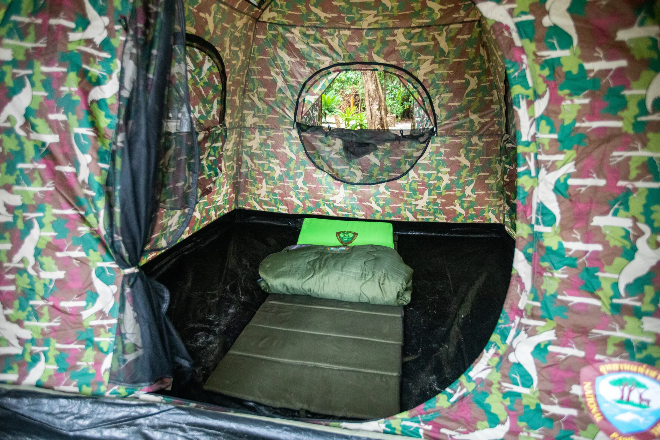 Sleeping mat and pillow inside a regular tent